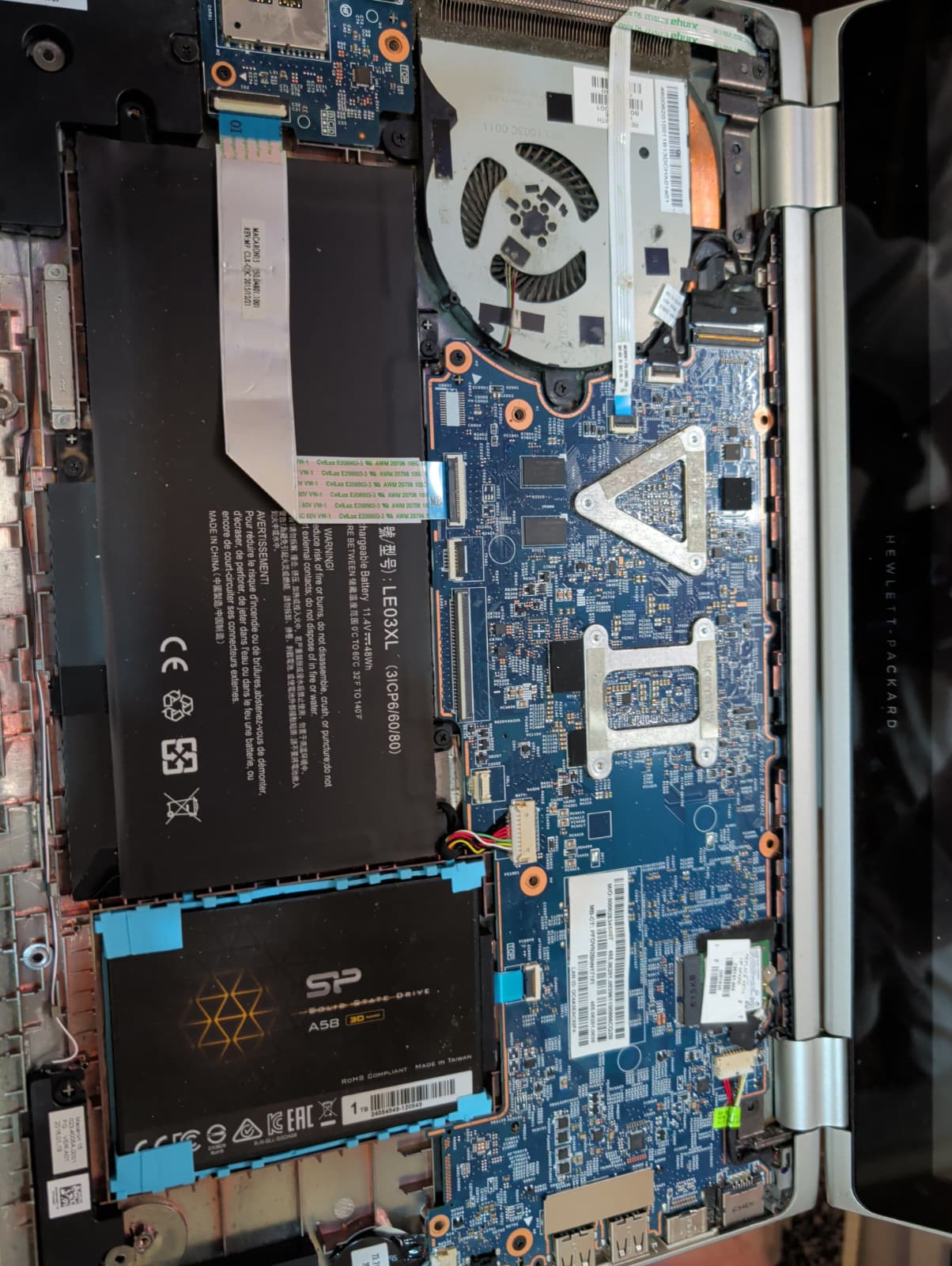 Laptop opened for internal diagnostic and repair by Glitch Tech Services